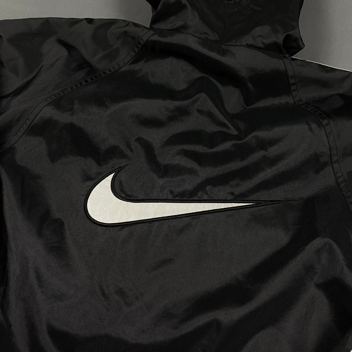 Vintage NIKE Reflective Back Swoosh Windbreaker / Track Jacket