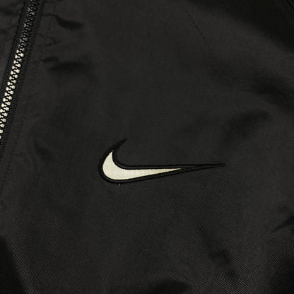 Vintage NIKE Reflective Back Swoosh Windbreaker / Track Jacket